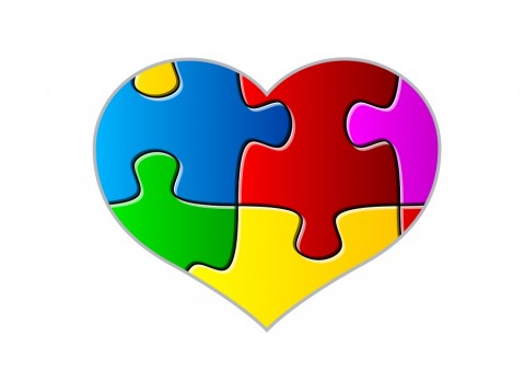puzzle pieces in a heart shape