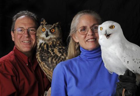 Marcia and Mark Wilson with snowy owl