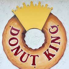 Donut King Logo - a donut wearing a crown