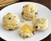 Four Irish soda bread biscuits on a plate