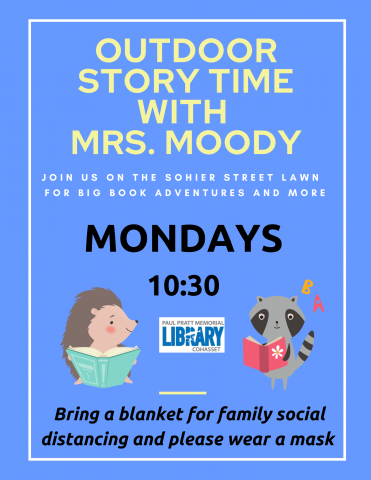 outdoor storytime with Mrs. Moody under the tent