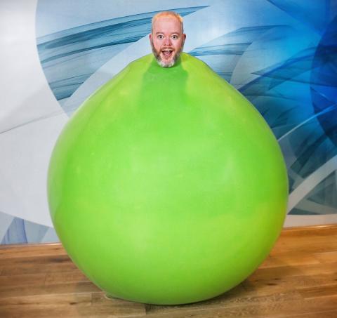 Man in green balloon