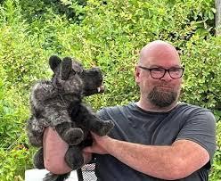 Man holding a puppet