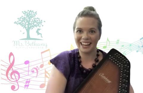 Ms. Bethany holding an autoharp