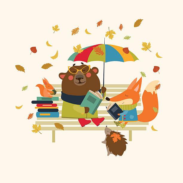 bear and fox sitting on a bench with books holding an umbrella with leaves falling